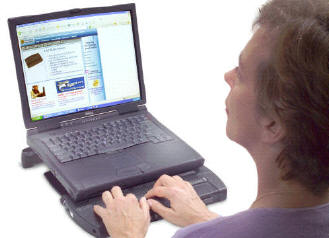 Man using Focus 40 connected to a PC laptop